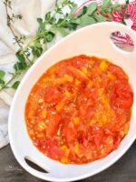 A bowl of blistered tomato sauce for pasta.