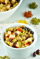 Fall salad with apples, chickpeas, cranberries and pumpkin seeds.