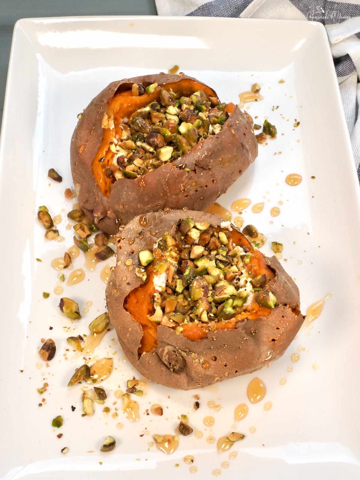 Loaded sweet potatoes stuffed with cheese, nuts and honey.