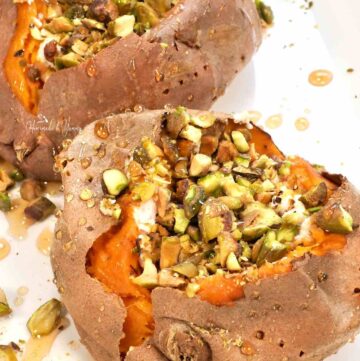 Jacket sweet potatoes stuffed with cheese, nuts and hot honey.
