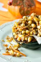 Stuffed acorn squash with sausage, apples and chickpeas.