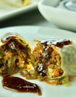Homemade baked lamb eggs rolls with Moroccan flair.