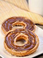 Simple toasted bagel with peanut butter and Nutella.