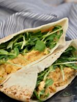 Chickpea pita sandwich with pea shoots.