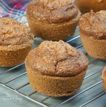 Pancake mix muffins on a cooling rack.