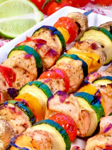 Grilled chicken skewers with veggies.