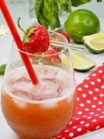 Strawberry tequila cocktail in a glass with ice.