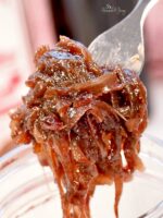 Caramelized onion jam on a fork.