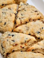 Homemade savory scones with sun-dried tomatoes and olives.