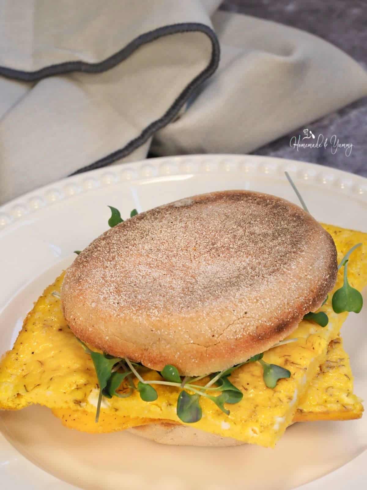 Sheet pan eggs made into sandwiches.