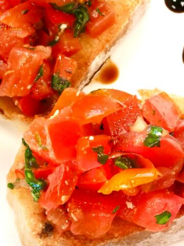 Tomato bruschetta on toasted baguette.