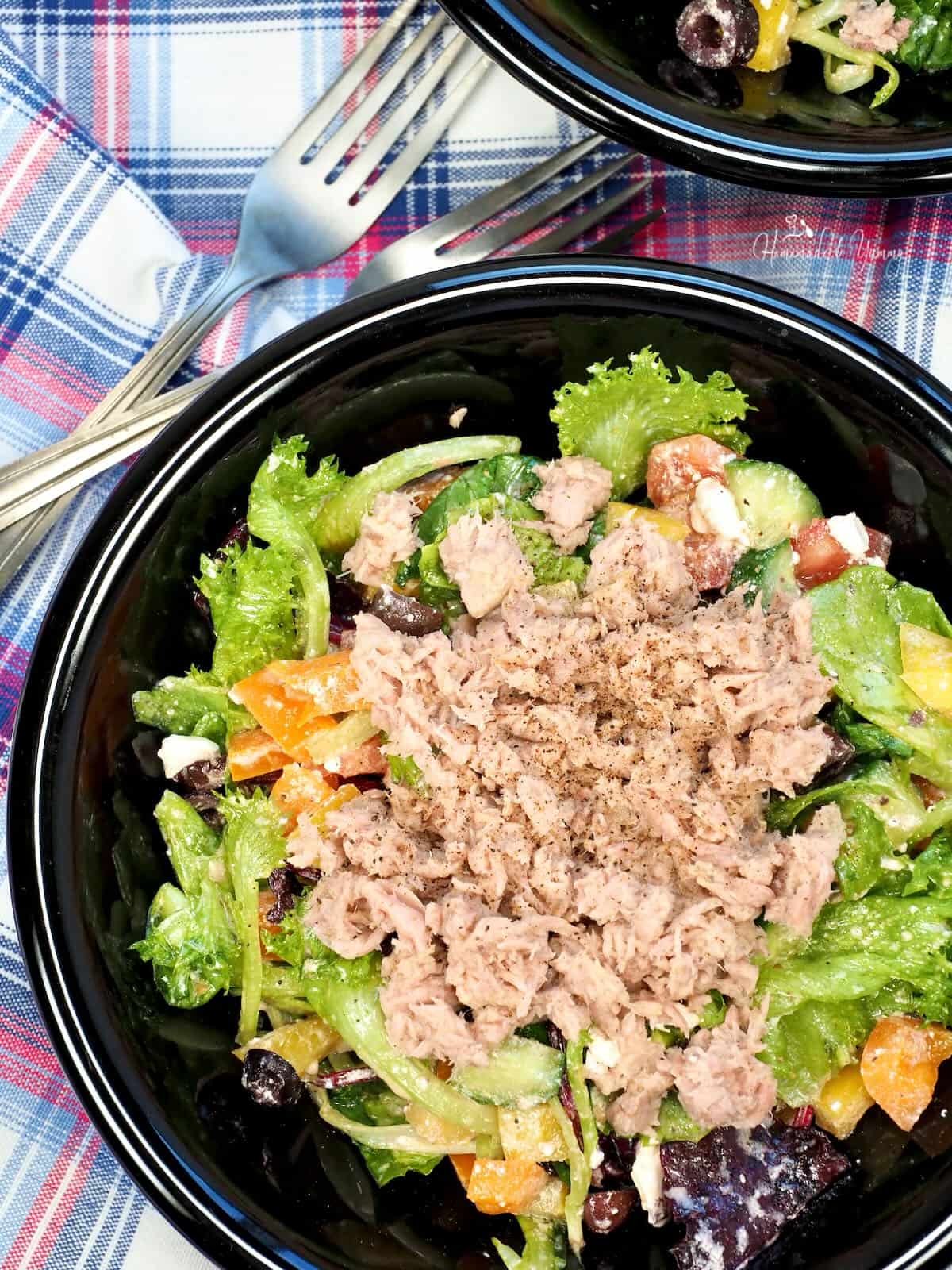 A simple green salad with tuna for an easy meal.