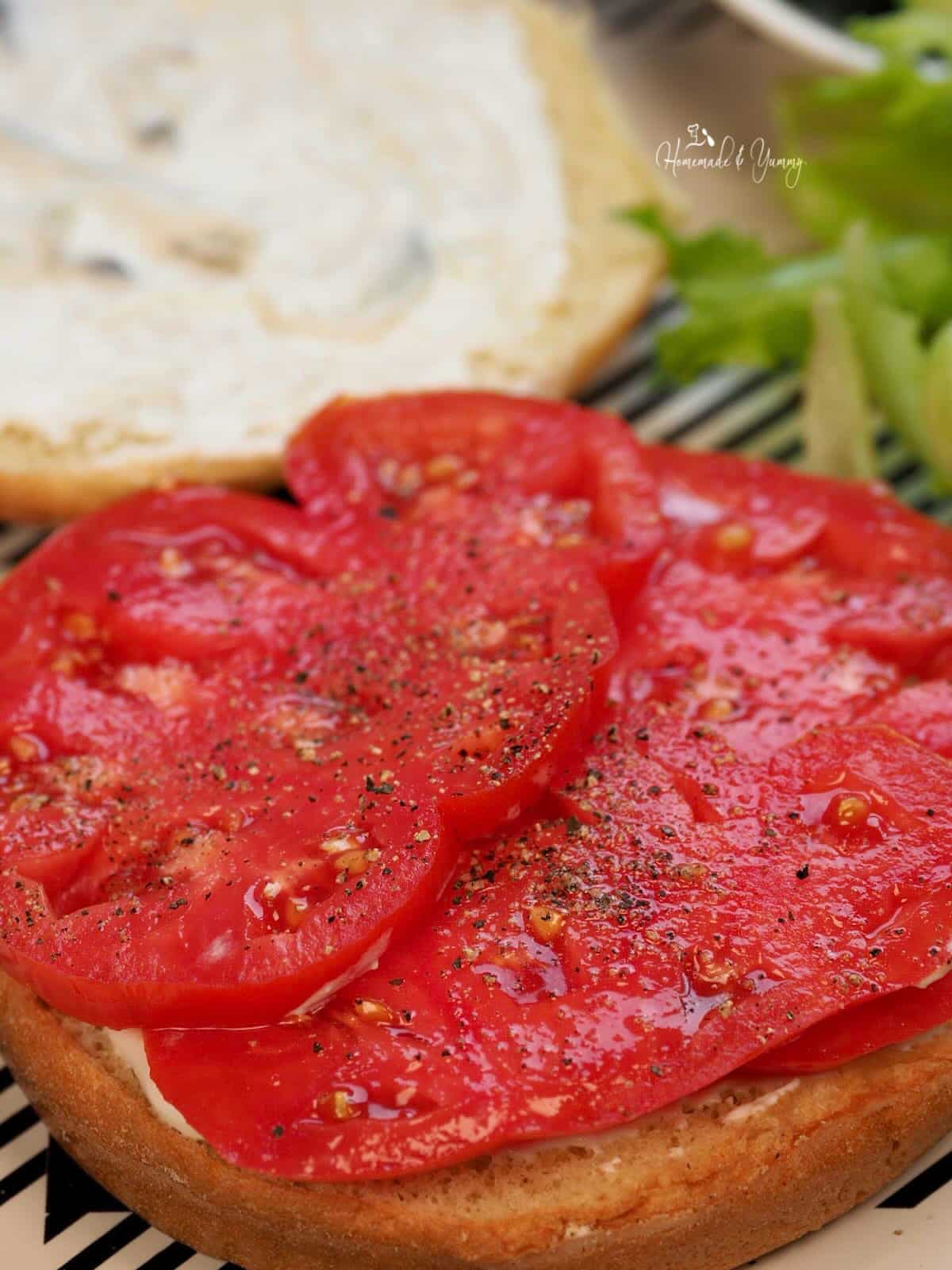 Slices of tomato on a sandwich.